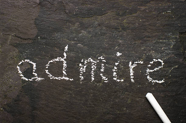 istock The word admire written with chalk on black stone. 465122244