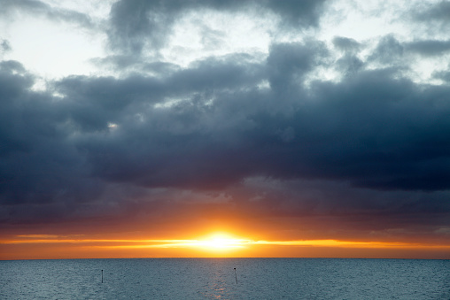 Storm clouds at sunrise at rogues point on yorke peninsula looking out over the sea