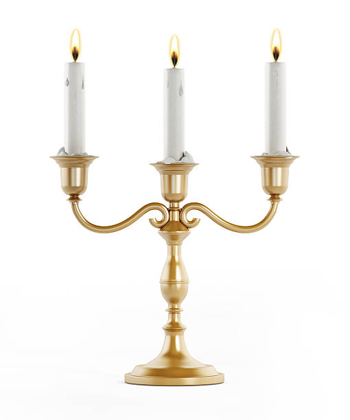 Candlestick holder Brass or gold candlestick holder with three burning candles isolated on white. candlestick holder photos stock pictures, royalty-free photos & images