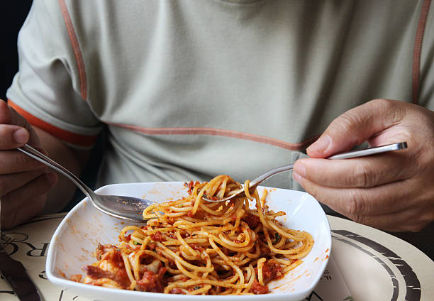 istock Fresh spaghetti with tomato sauce close up 465124654