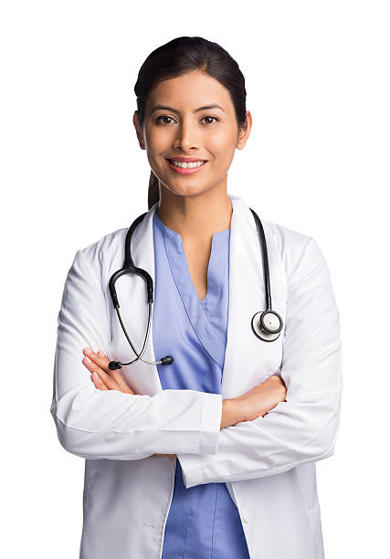Female doctor Female doctor standing with her arms crossed and smiling isolated over white background female doctor stock pictures, royalty-free photos & images