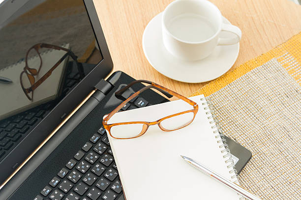 istock Wooden table with office supplies 465124978