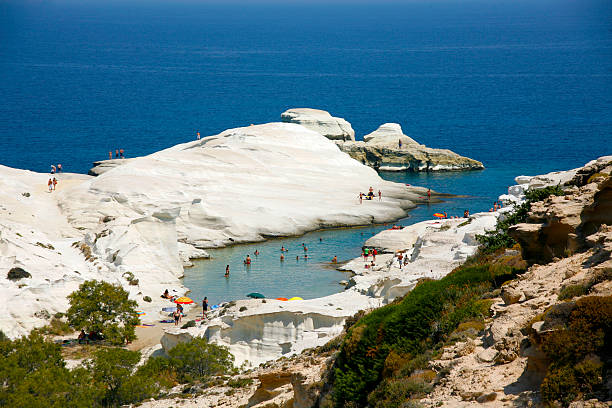 istock beach and moonlike rocks in Sarakiniko Greece 465126172