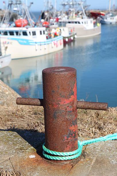 istock Rope tied to a mooring post 465126340
