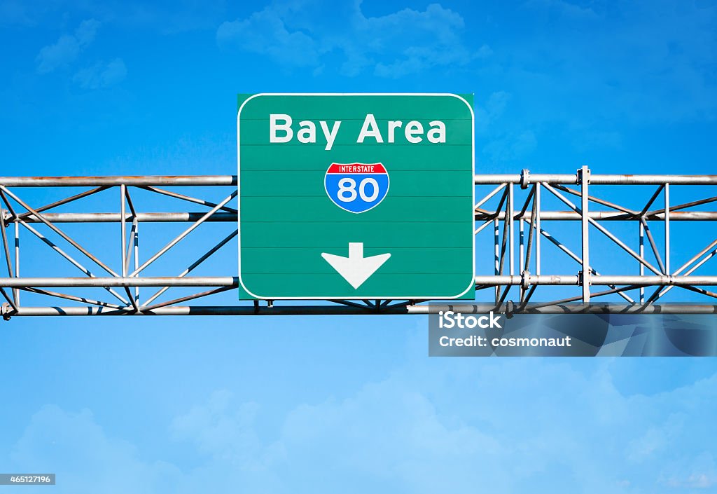 Bay Area Interstate 80 Sign An elevated overhead highway sign. It reads "Bay Area" and has an Interstate 80 shield above an arrow pointing downward. The font used is public domain/free: http://www.dafont.com/blue-highway.font  Road Sign Stock Photo