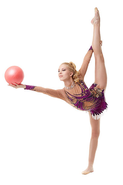 istock Pretty blonde gymnast dancing with ball 465127374