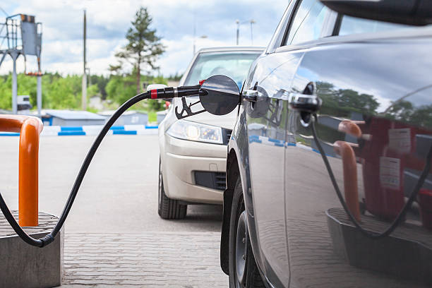 istock Refilling car with gasoline at the gas station 465128309