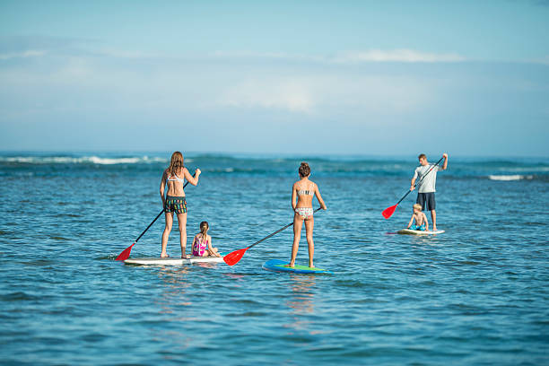 istock Family paddleboarding in Hawaii 465128942