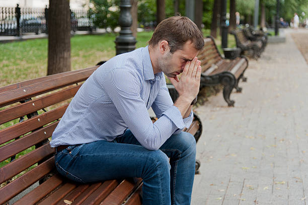 istock Man sits in the public garden 465129831