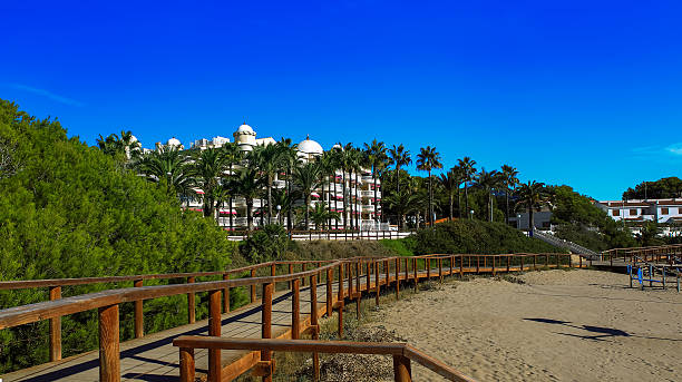 istock Walking road to the beach 465130623