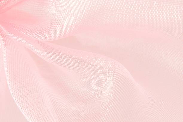 pink organza macro blurry texture background