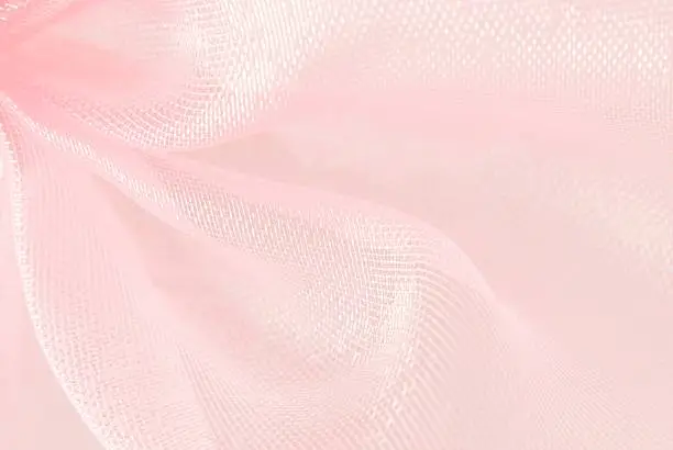 pink organza macro blurry texture background
