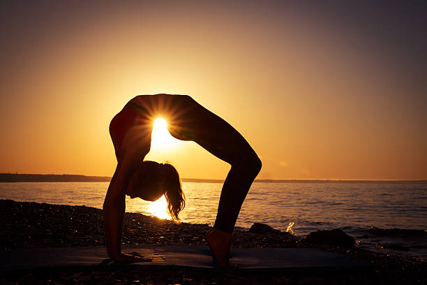 istock Yoga at the sea 465133354
