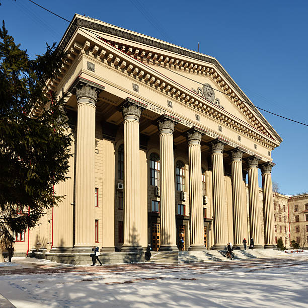 Novosibirsk, Russia - February 10, 2015: People in front of the main entrance to the Siberian State University of railway engineering. Found in 1932, now it is one of the leading technical universities of Russia in the transport industry