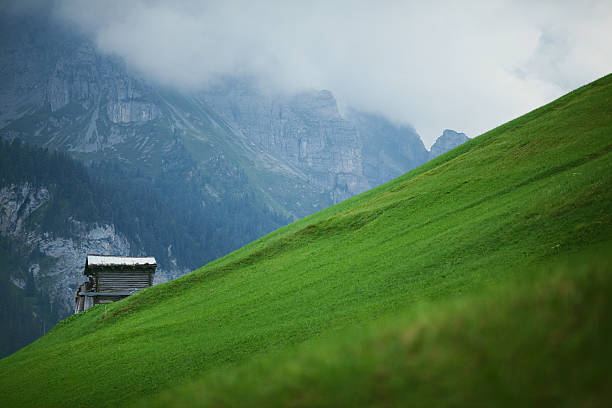 istock Mountain Hut on a hill overlooking Gimmelwald, Switzerland 465135075