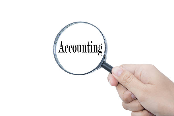 istock Hand Showing Accounting Word 465135371