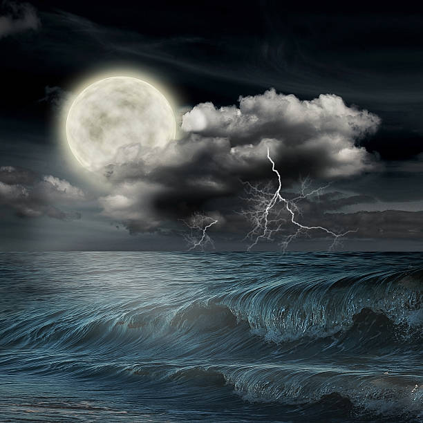 istock storm evening on ocean and the moon 465135637