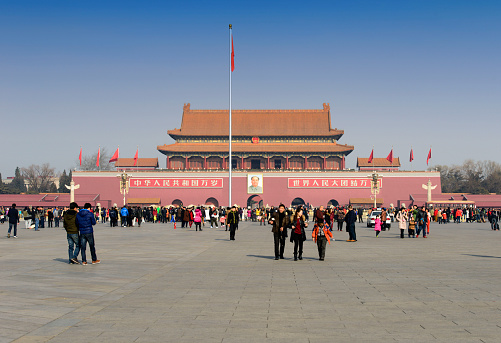 Beijing, China - January 18, 2015: Many tourists visit Tiananmen square.