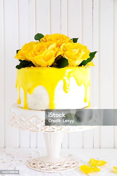 Homemade Carrot Cake Decorated With Yellow Roses And Glaze Stock Photo - Download Image Now