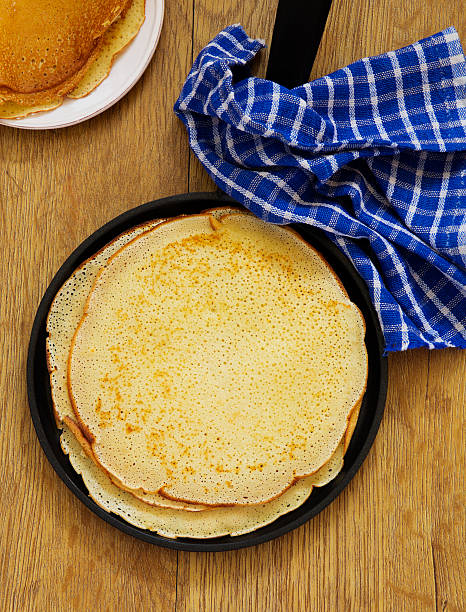 istock Russian pancakes with honey and fresh berries. 465139242
