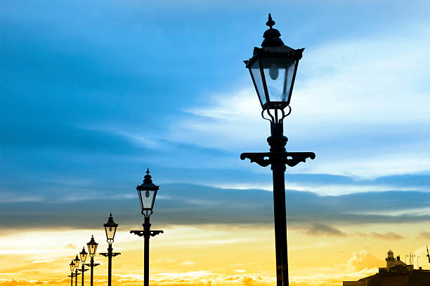 istock lighthouse and row of vintage lamps 465139368