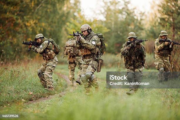 Group Of Soldiers Engaged In The Exploration Area Stock Photo - Download Image Now - Military, Armed Forces, Army Soldier