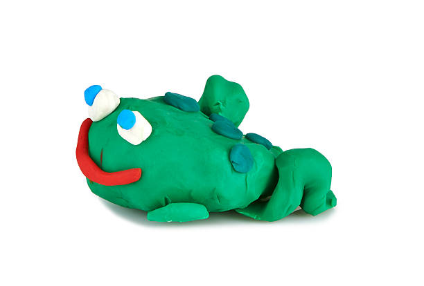 istock children's toy molded from clay - frog 465141101
