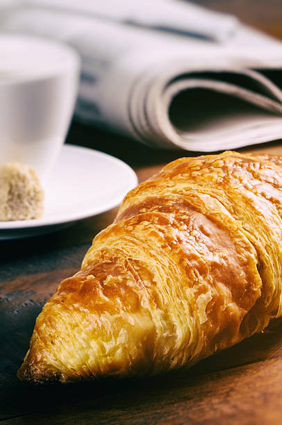 istock Breakfast with coffee cup and croissant 465141468