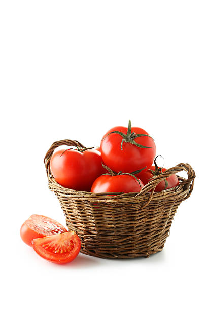 istock Fresh red tomatos in basket isolated on white 465142250