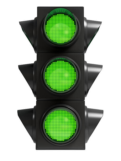 Green traffic light Green traffic light. Isolated on white background green light stoplight photos stock pictures, royalty-free photos & images
