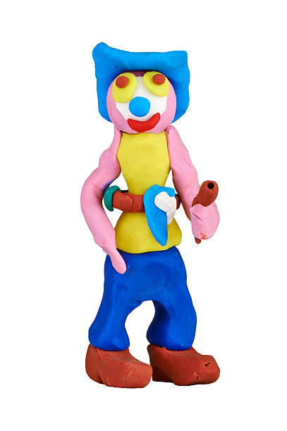 istock children's toy molded from clay - cow boy 465144305