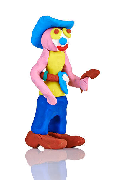 istock children's toy molded from clay-cow boy 465144367