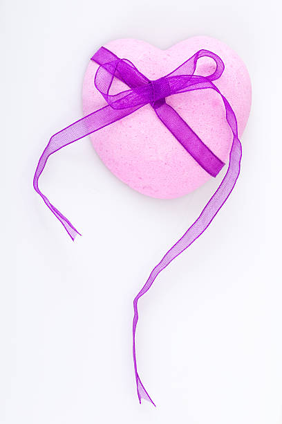 istock pink heart with ribbon 465144709