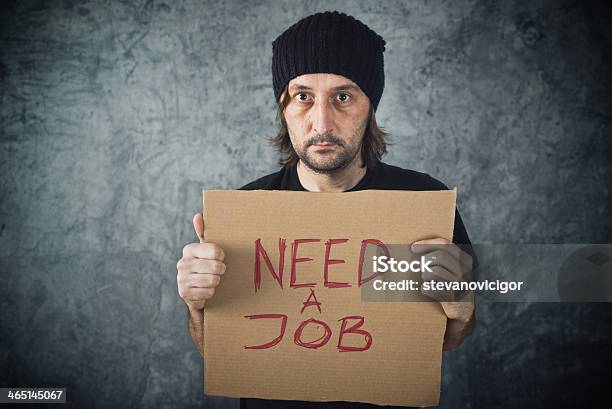 Man Holding Cardboard Paper With Need A Job Message Stock Photo - Download Image Now