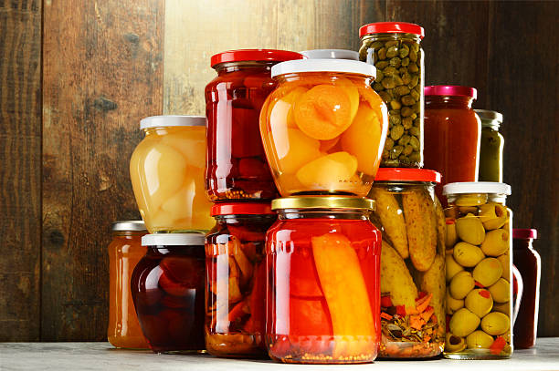 istock Jars with pickled vegetables, fruity compotes and jams isolated 465145304