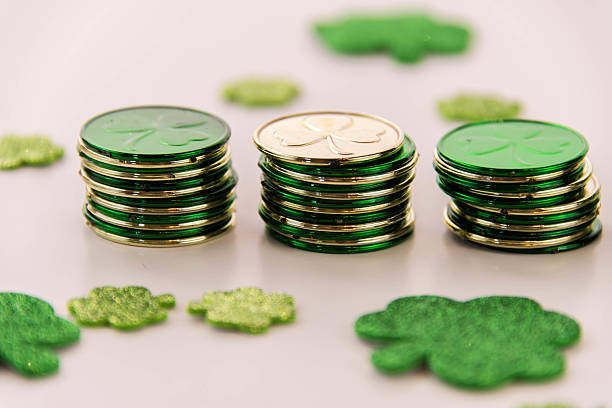 istock Saint Patrick's Day - coins and shamrocks 465149772