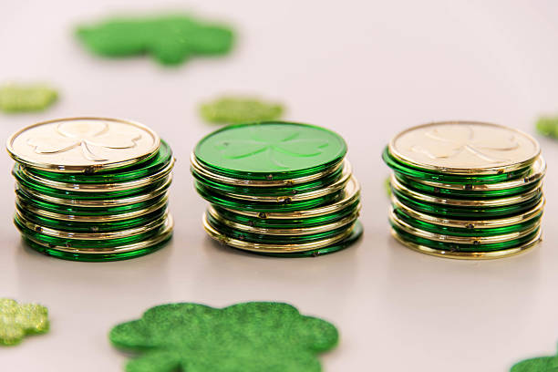 istock Saint Patrick's Day - coins and shamrocks 465149774
