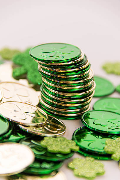 istock Saint Patrick's Day - coins and shamrocks 465149782