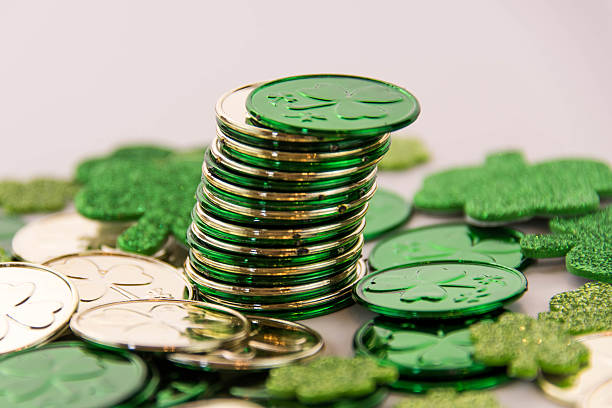 istock Saint Patrick's Day - coins and shamrocks 465149798