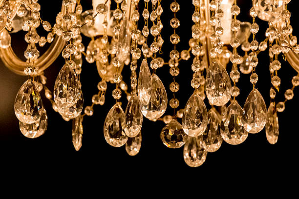 istock Gallant chandelier with light candles and dark background 465149912