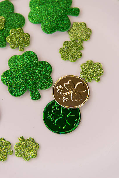 istock Saint Patrick's Day - coins and shamrocks 465150226