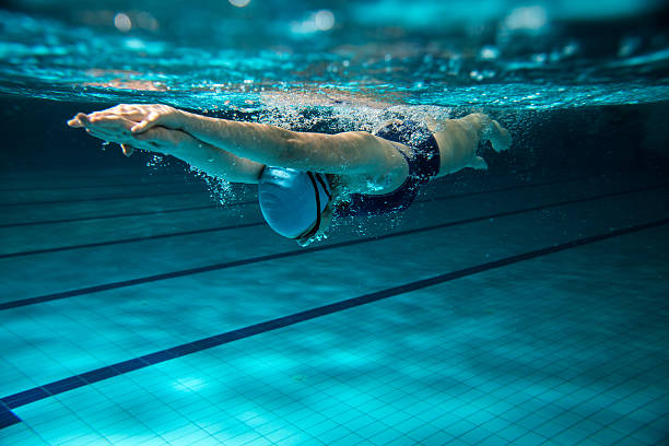 istock Female swimmer at the swimming pool. 465150476