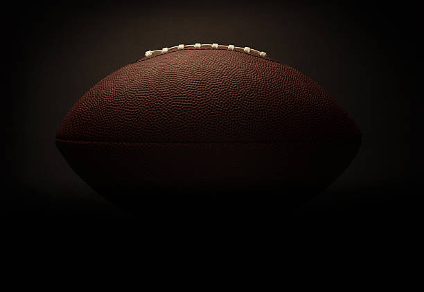 Football on a black background