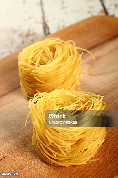 Pasta Tagliolini Stock Photo - Download Image Now - Couscous, Cracked, Cutting Board