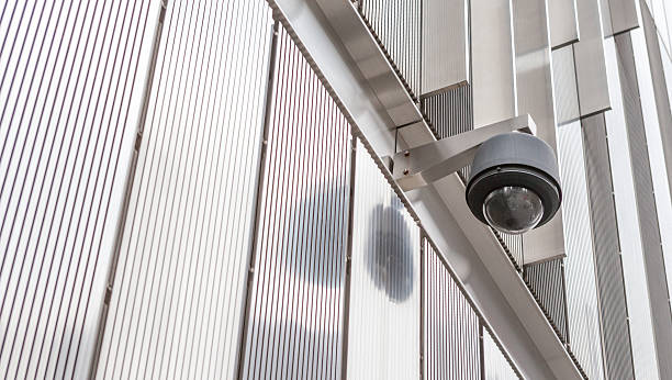 istock Security camera, CCTV in front of the building 465154270
