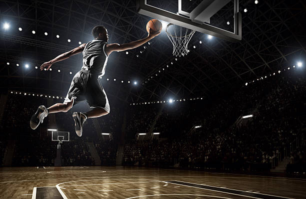 istock A picture of a basketball player dunking 465154368