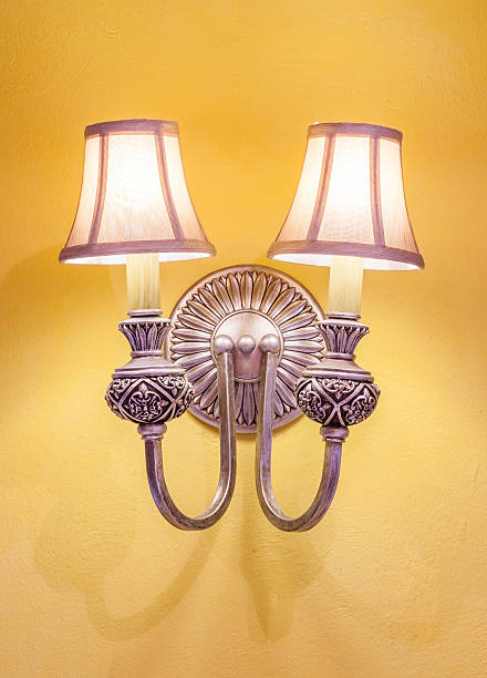 istock Vintage wall lamp on the yellow wall 465156308