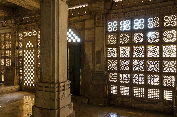 istock Carved stone grilles pattern at Sarkhej Roza mosque, Ahmedabad 465156818