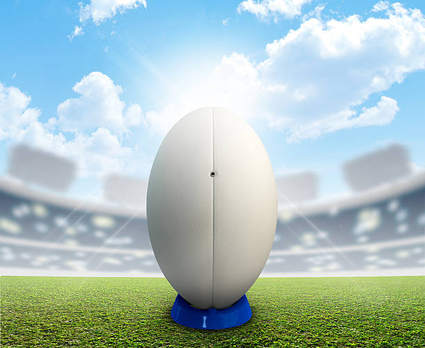 istock White rugby ball on the tee waiting to be kicked 465158130