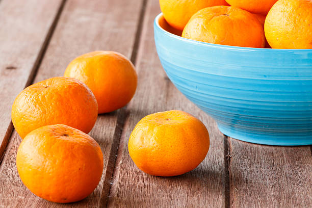 istock orange on wooden 465158230